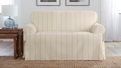 Designers keep swearing slipcover sofas aren’t going anywhere – I’m not ready to drop $1,000s, but this Nancy Meyers-coded $41 cover just made it into my cart