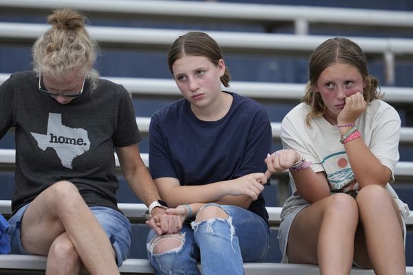 Texas mourns flood victims at vigil as search continues for dozens missing