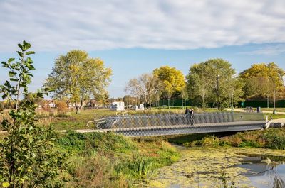 London's largest park since the 2012 Olympics opens along with new village