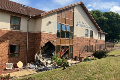 Several injured after car crashes into care home during police chase