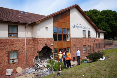 Two arrested after care home crash leaves eight in hospital