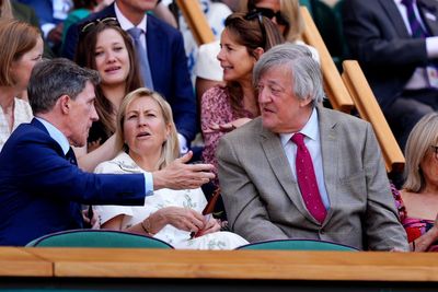 Sir Stephen Fry and Ellie Goulding lead famous faces in Wimbledon Royal Box