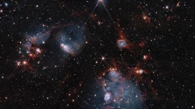 Hubble and James Webb Space Telescopes show 2 sides of star cluster duo | Space photo of the day for July 10, 2025