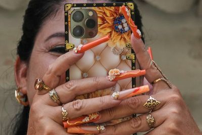 Photos of Cuban women embracing nail art as escape from economic crisis
