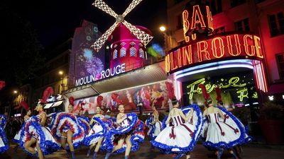Moulin Rouge celebrates as blades of famous windmill turn again