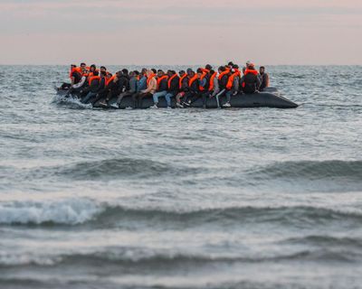 EU to assess legality of UK-France migrant return deal before expressing support