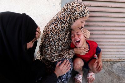 Ten children outside Gaza medical clinic among victims of latest Israel strike