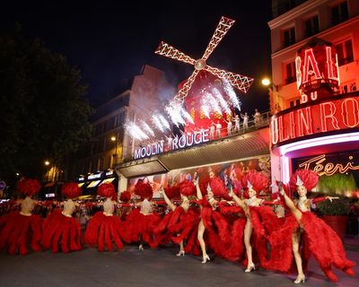 Paris rejoices as Moulin Rouge windmill sails turn again year after collapse