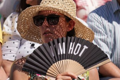 Taylor Fritz sends water bottle to unwell fan as heat impacts Wimbledon again