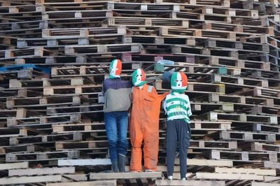 Effigies of Kneecap, Irish flags and sectarian slogans top loyalist bonfires