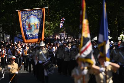 Tens of thousands take part in Twelfth celebrations in scorching temperatures