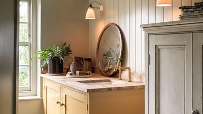 5 stylish and smart ways to store your toilet paper so it’s accessible but out of sight