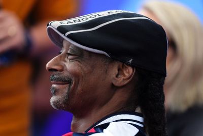 Snoop Dogg unveils Swansea kit in dig at Ryan Reynolds and Wrexham