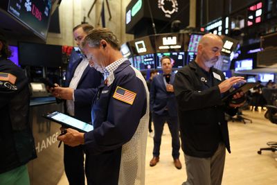Dow futures sink as Trump keeps pushing tariffs while White House suggests Powell's job could be at risk