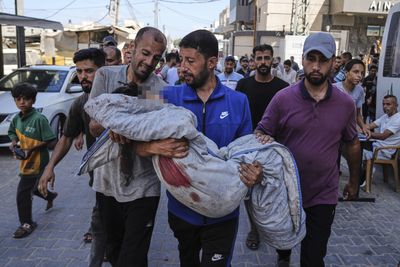 Israel bombs Gaza market, water point, as total death toll passes 58,000