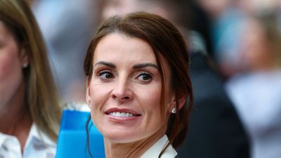 Coleen Rooney sticks to Wimbledon whites for her visit to SW19, and this timeless dress silhouette is one worth replicating