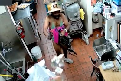 An armed man dressed in a bikini storms a donut shop – but staff fight back