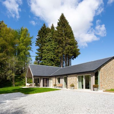 This is how to resurface a driveway, including whether you can do it yourself and how long before you can park on it