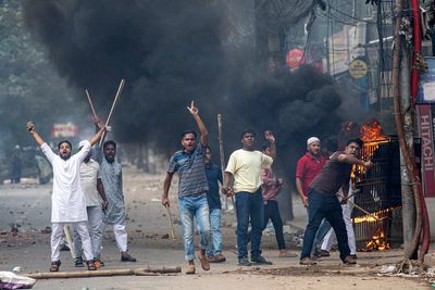 Bangladesh struggles to contain the fallout of an uprising that toppled its leader last year