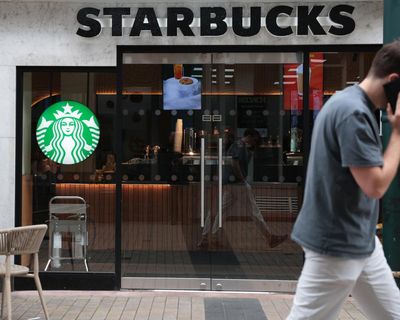 Starbucks tells corporate staff in US and Canada to work in office at least four days a week