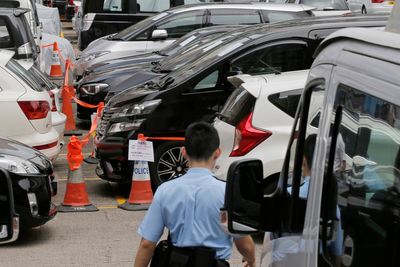 Hong Kong plans to regulate Uber and other online ride-hailing services