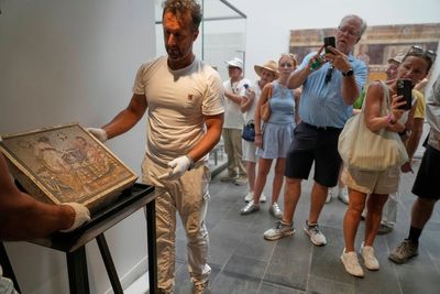 Erotic Roman mosaic stolen by Nazis during Second World War returns to Pompeii