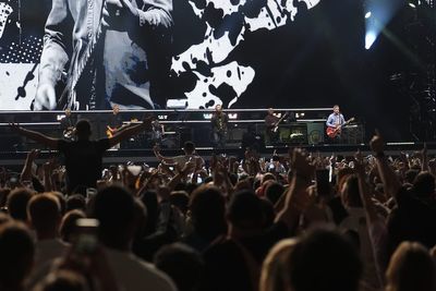 Fences erected at Oasis’s Manchester gig site as ticketless fans urged not to go
