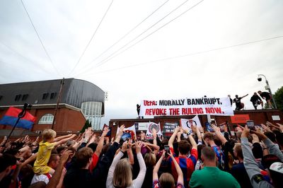 'Morally bankrupt': Crystal Palace fans march to Selhurst Park in protest at Europa League relegation