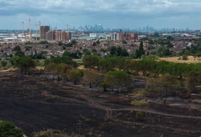 Firefighters tackle fourth London wildfire in 24 hours as residents battle blaze with hoses
