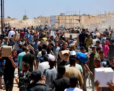 At least 20 Palestinians killed in crush at food distribution site in southern Gaza