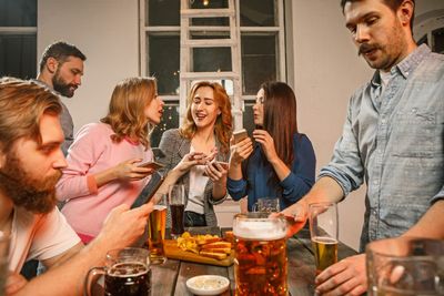 5 Foods That Make You Seem “Old” at a Social Event