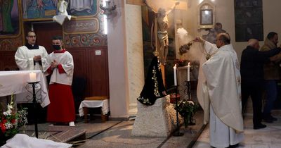 2 killed and priest among injured as air strikes hit Gaza’s only Catholic church