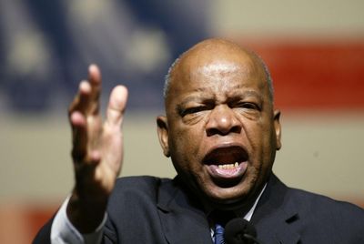 Tens of thousands in US join ‘Good Trouble’ anti-Trump protests honoring John Lewis