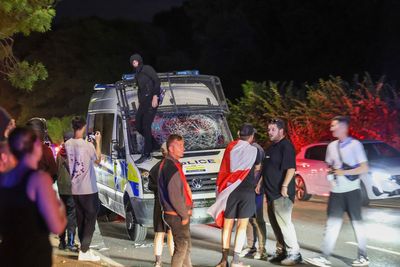 Epping protest: Police hunt thugs after officers injured amid violent scenes outside migrant hotel