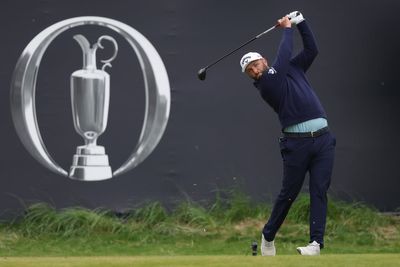 Jon Rahm reacts after Open fan whistles during tee shot