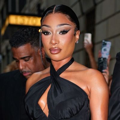 Megan Thee Stallion Takes Her Relationship Red Carpet Official in a Belted Off-White Gown