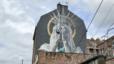 Liberty covers her eyes as French mural sparks global reaction