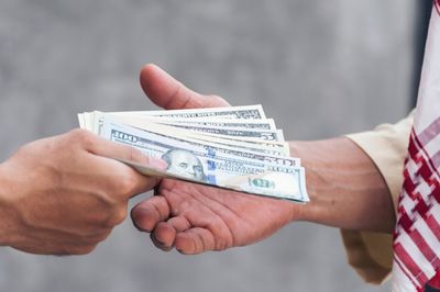 Here’s Why Some People Still Carry Cash—And It’s Not What You Think