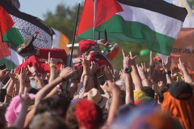 Kneecap and Brian Eno call on artists to join syndicate to support Palestine