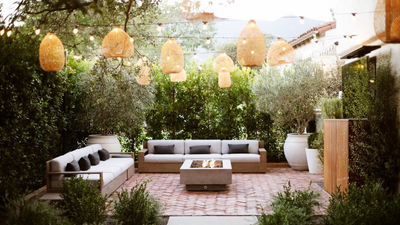 I'd Never Buy Basic Black Festoon Lights for My Garden Now That I've Seen These Ones in the Summer's Most On-Trend Colors
