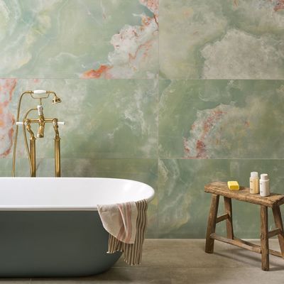 ‘Calming but confident’ – forget marble, onyx tiles are the luxe tile trend appearing in the most stylish homes this year