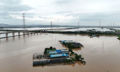 Four dead as South Korea lashed by torrential rain, displacing thousands