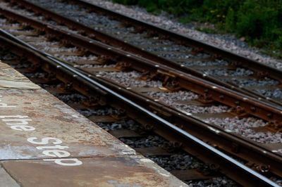 Driver in his 70s dies after car crashes on to railway track