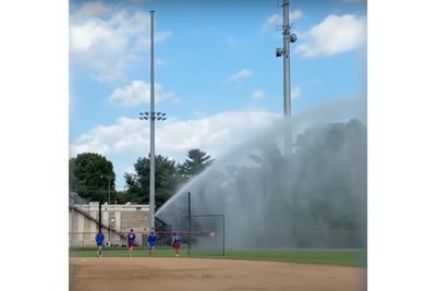 WATCH: Firefighter Floods Teens' Baseball Game With Fire Hose After Ball Hit His Truck