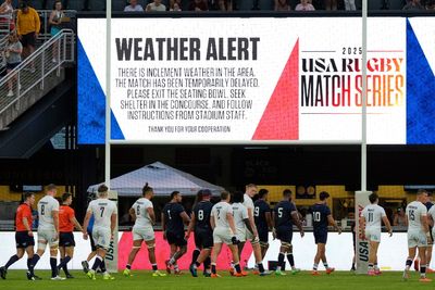England’s clash with USA plagued by weather delays as lightning fears brings match to halt