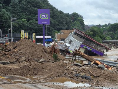 At least 14 dead in South Korea after heavy rains trigger landslide, floods