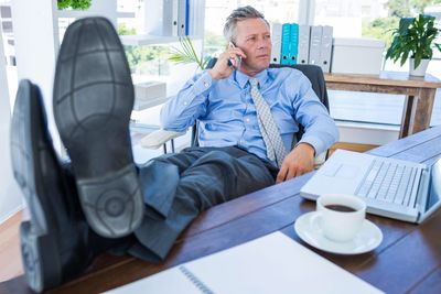 Successful billionaires, politicians and CEOs are not 'the smartest'—they’re actually ambitious and lazy, career coach to the Fortune 500 says