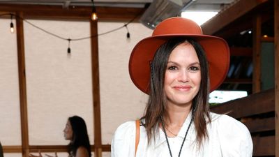 Rachel Bilson's striped maxi skirt and trainers combination is a fun and colourful look that works for any weekend plans