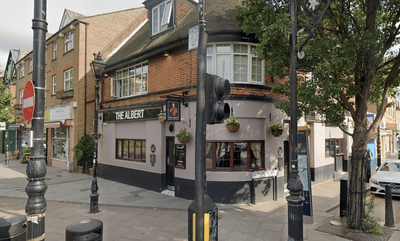 Man killed after car ploughs into east London pub in early hours as two arrested at scene