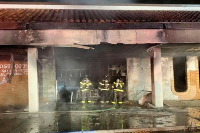 Suspect arrested after car crashes into post office and catches fire in San Jose, California